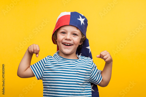 Adorable boy with American flag