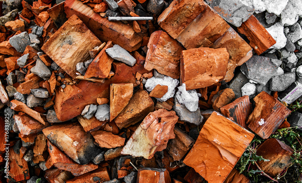 Construction garbage background. Pieces of broken bricks Construction garbage background. Pieces of broken bricks