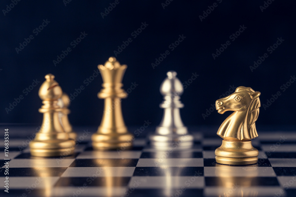 Chess on a chessboard at black background, Business leader concept. vintage tone. Chess on a chessboard at black background, Business leader concept. vintage tone.