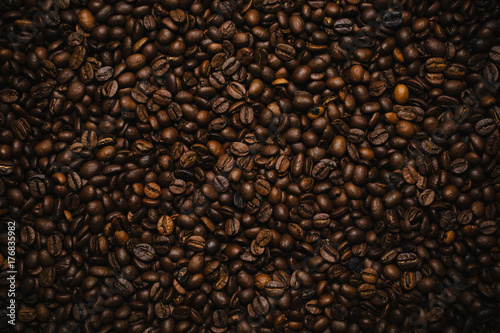 Top viev of coffee beans background texture photo