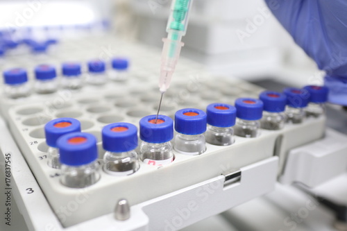 A syringe for injecting a sample into a tube set in gas chromatography for chemical analysis
