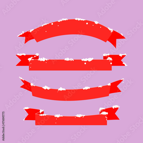 Set of empty red ribbons strewn with snow