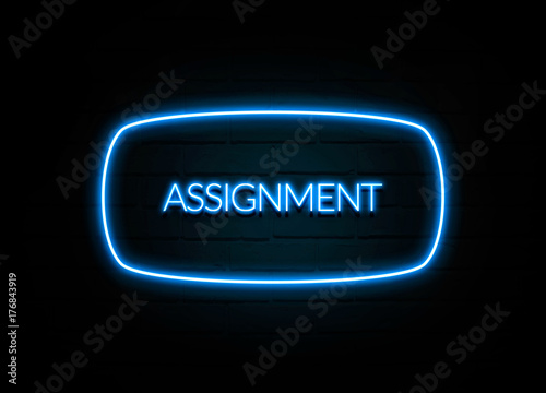Assignment  - colorful Neon Sign on brickwall