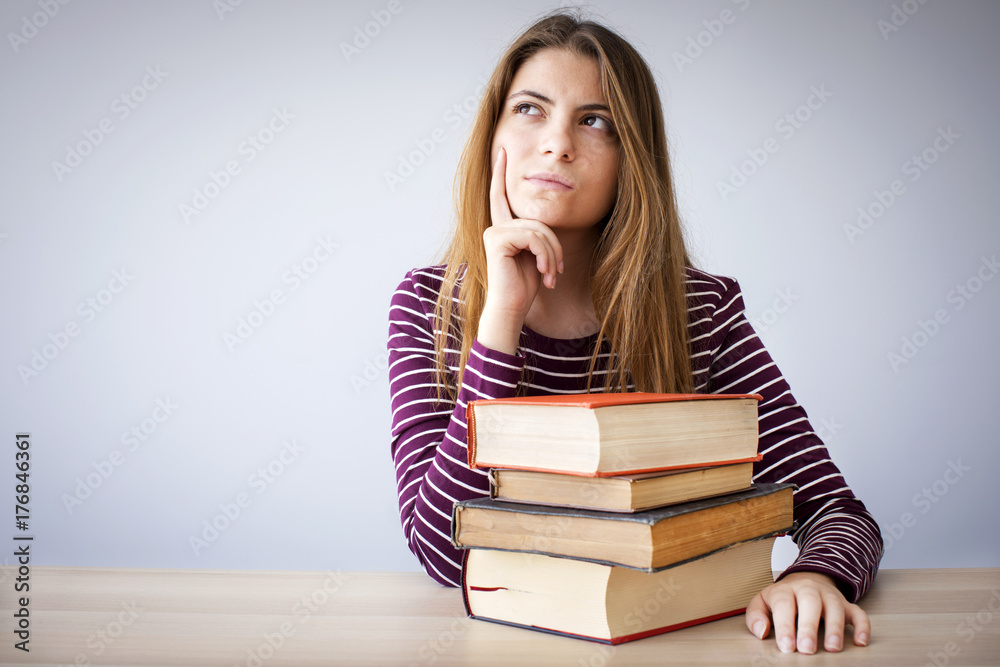 Student thinking and looking up Student thinking and looking up