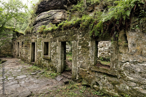 Fototapeta Naklejka Na Ścianę i Meble -  Walls of broken abandoned mill