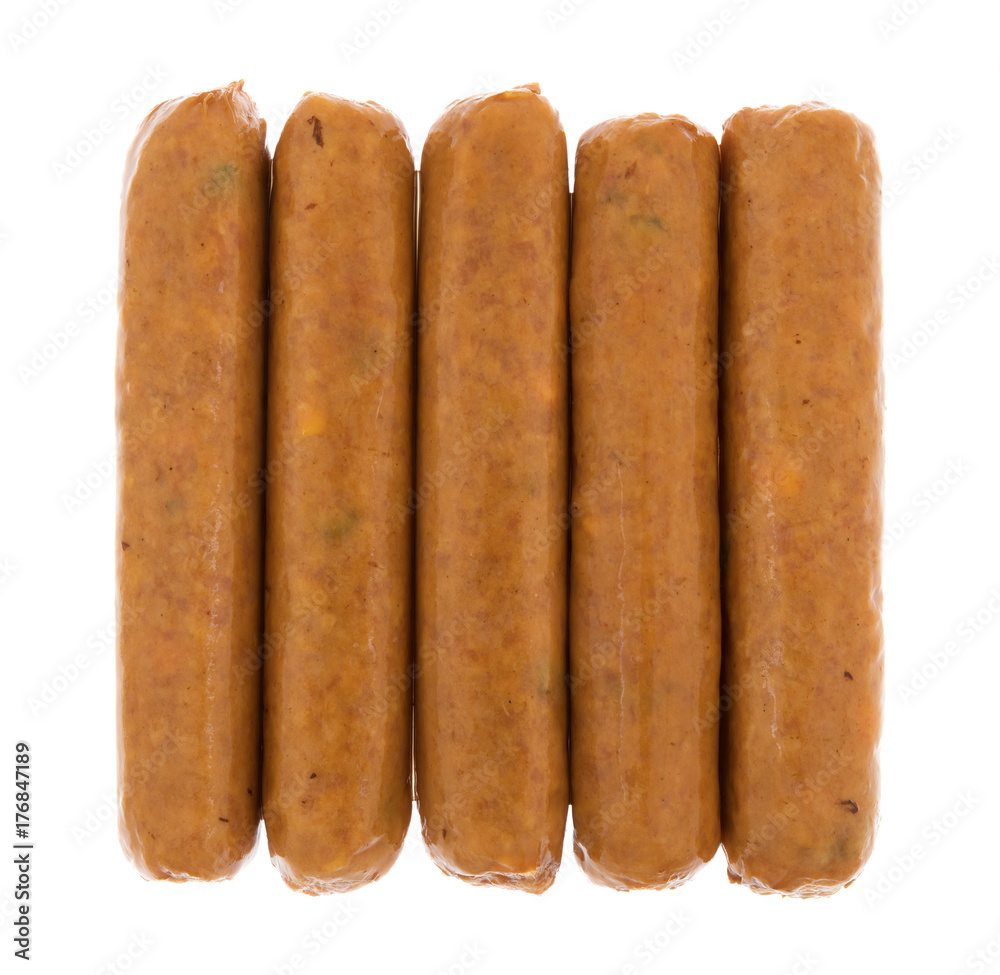 Top view of several cheddar cheese and jalapeno pepper sausages in a row isolated on a white background. Top view of several cheddar cheese and jalapeno pepper sausages in a row isolated on a white background.