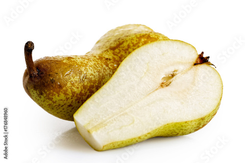Single abate fetel pear next to a half of pear isolated on white.