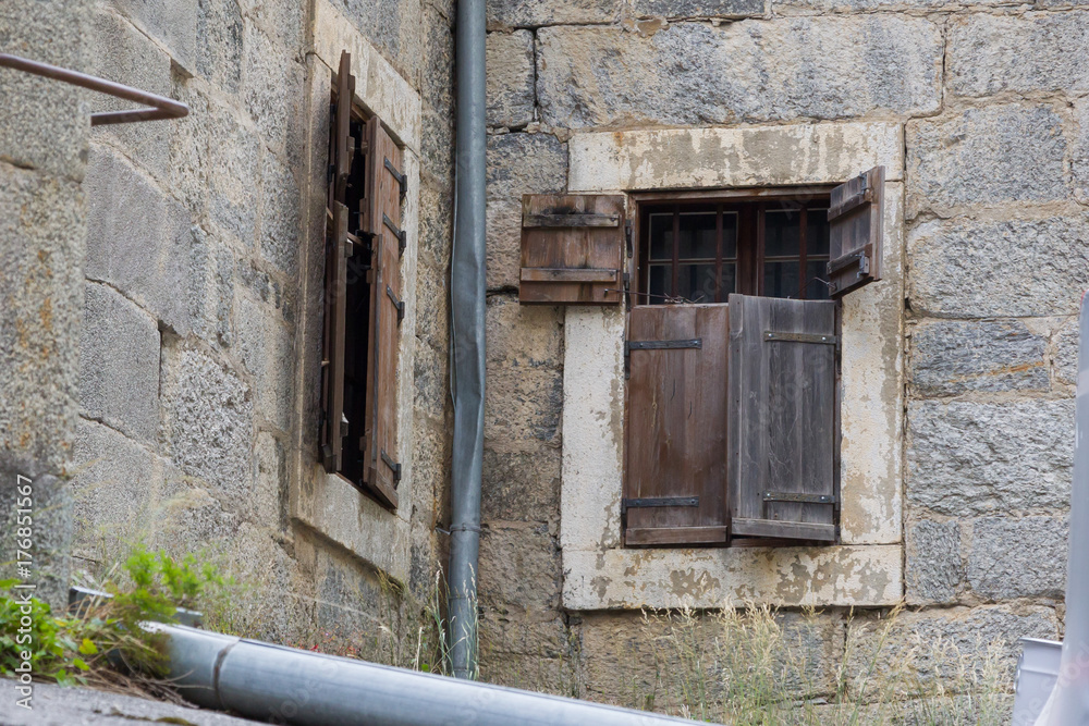 Wooden shutter, old wall