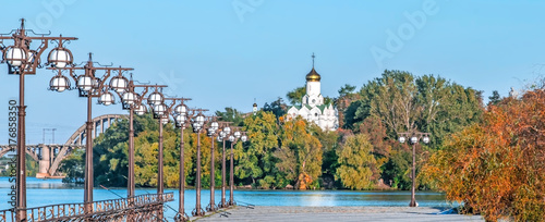Panorama of The Christian Church on Monastyrsky Island in the city of Dnepr on the river.. Dnepropetrovsk, Dnipropetrovsk, Dnipro city, Ukraine. Sunny Autumn day. photo