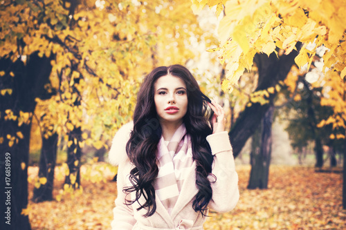 Perfect Autumn Woman Model with Dark Curly Hair, Fashion Girl Outdoors