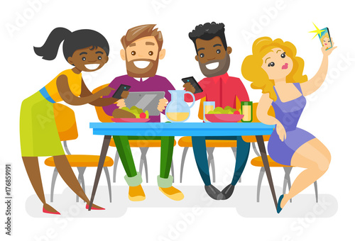 Multiethnic group of young friends sitting together at the table with smartphones and tablet computer. Caucasian white and African friends hanging out together. Vector isolated cartoon illustration.
