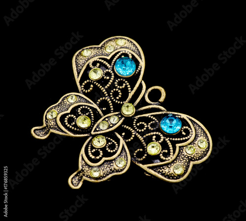 Luxury pendant butterfly with diamonds on black background