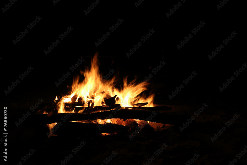 Bonfire burning on a dark background