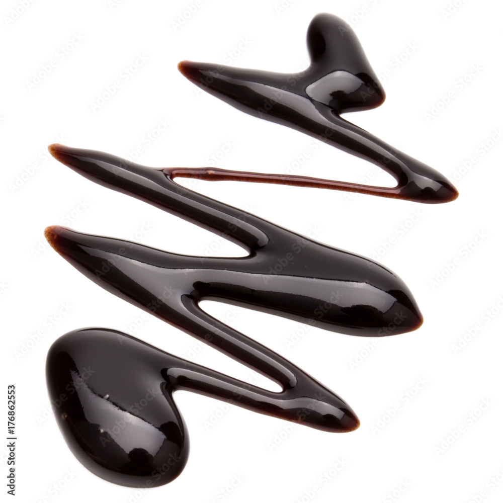 Obraz premium Chocolate syrup drop isolated on white background