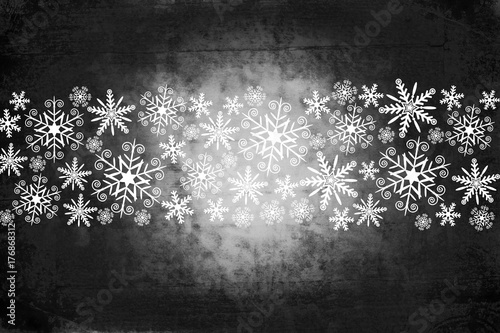 Grungy style, dark gray Christmas background with white snowflakes photo