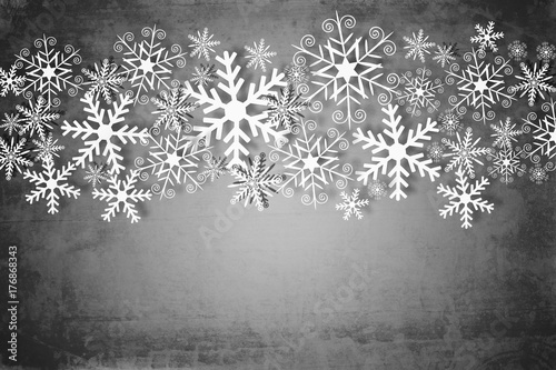 Grungy style, dark gray Christmas background with white snowflakes photo