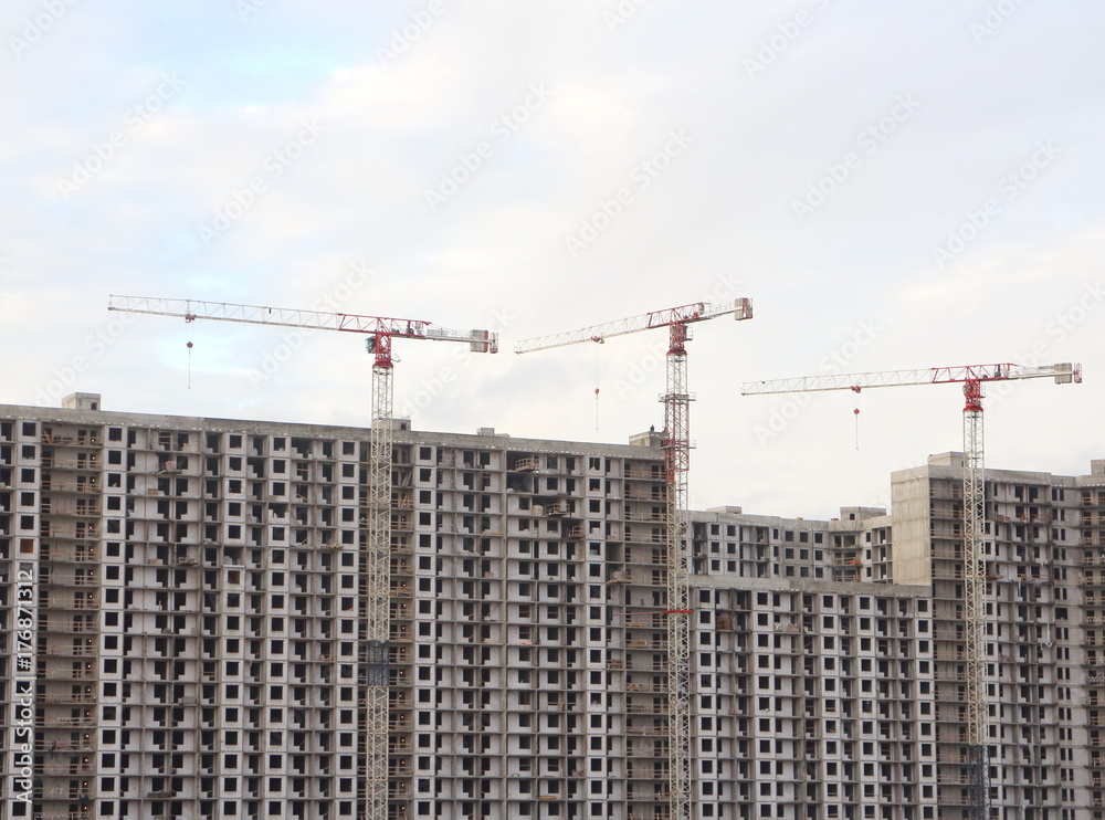 Construction of high-rise buildings, tower cranes Construction of high-rise buildings, tower cranes