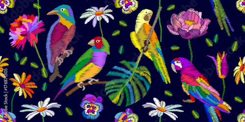 Colorful birds in the tropical garden.