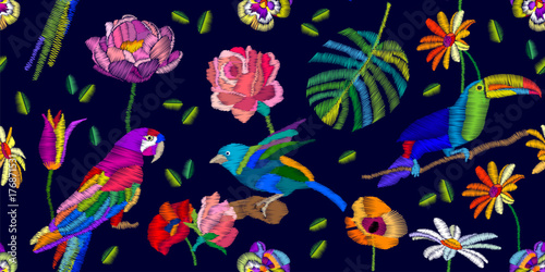 Colorful birds in the tropical garden.