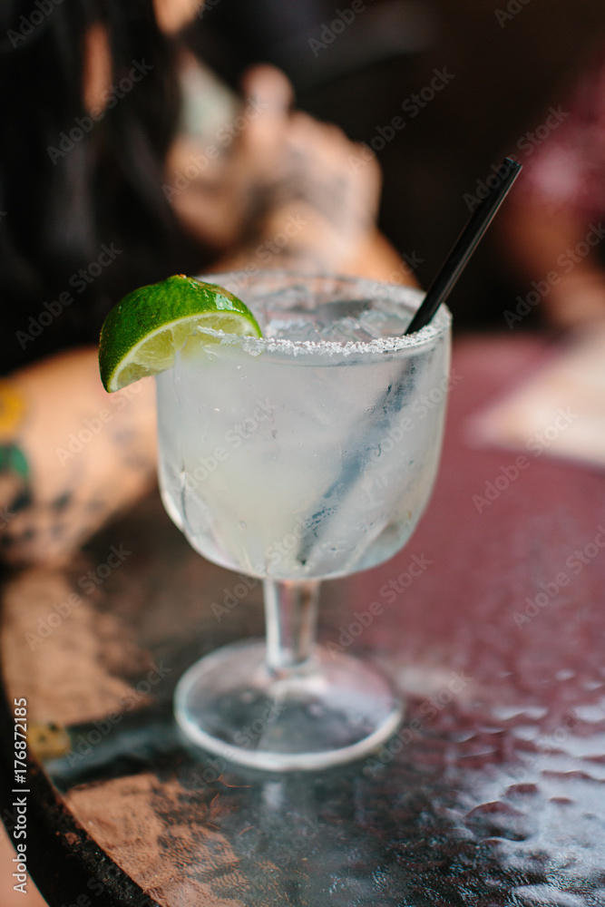 Large margarita on the rocks with salt and lime Large margarita on the rocks with salt and lime