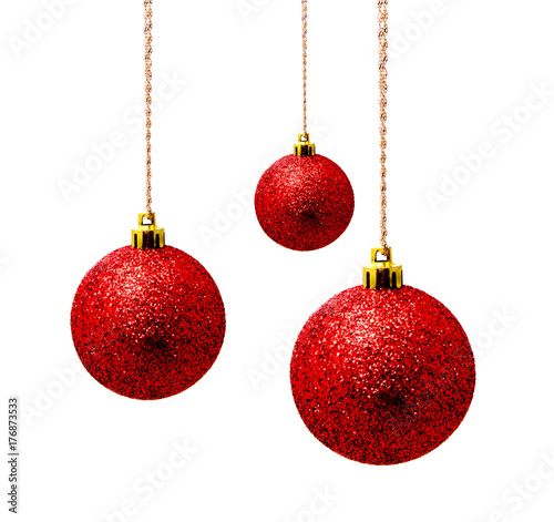 Hanging red christmas balls isolated on a white