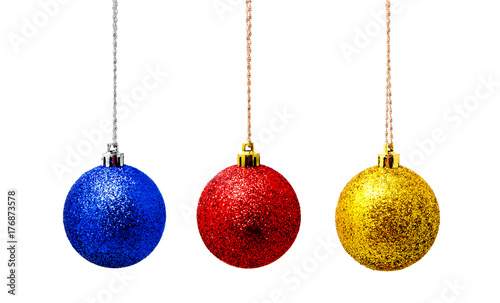 Hanging blue red yellow christmas balls isolated on a white