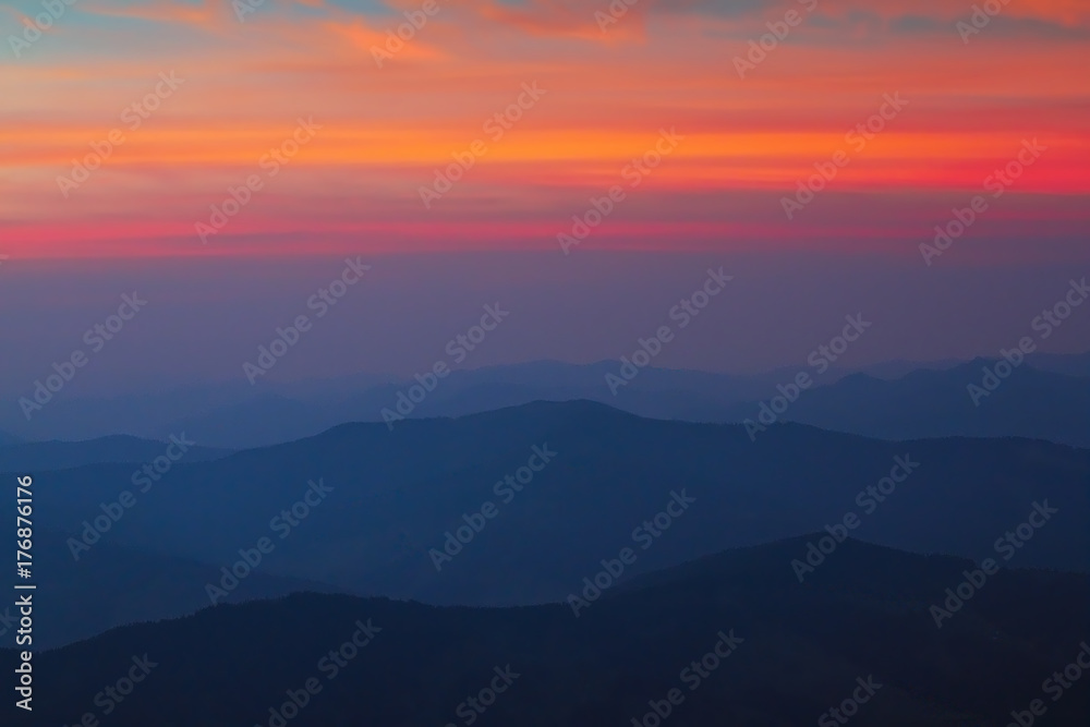 beautiful colors of dawn over the hills