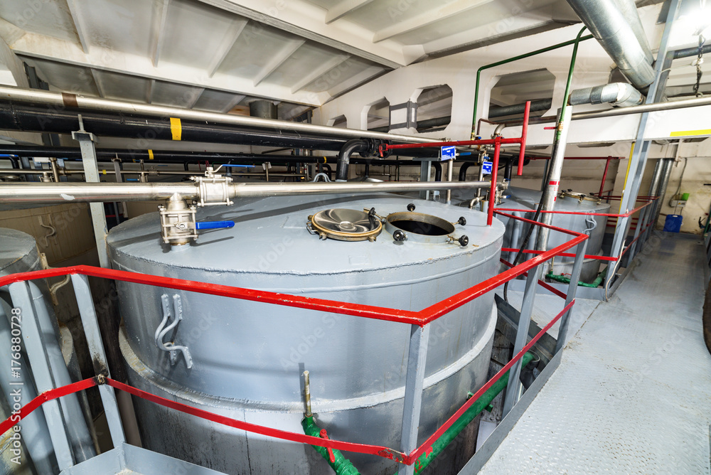 Large steel tanks for fermenting the yeast mixture.