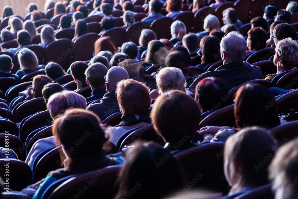 People in the auditorium during the performance. A theatrical production. People in the auditorium during the performance. A theatrical production.