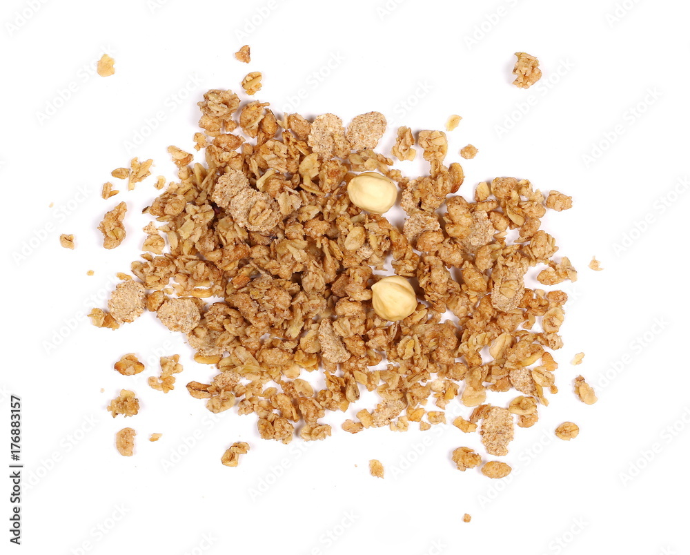 Crunchy granola, muesli pile with nuts isolated on white background, top view Crunchy granola, muesli pile with nuts isolated on white background, top view