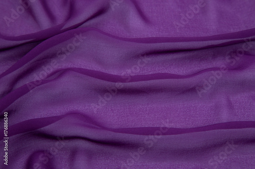 purple crumpled rayon on a white base with waves decomposed