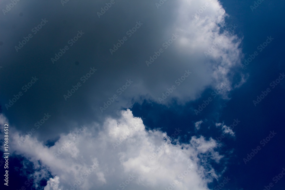 Fototapeta premium The dark clouds in the blue sky.