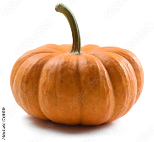 Imperfect raw organic orange pumpkin isolated on white background