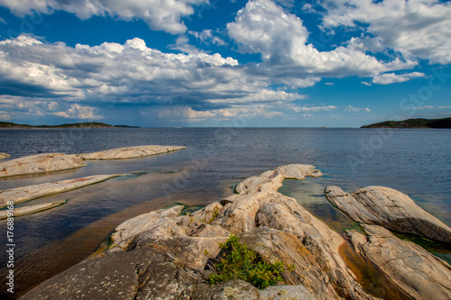 Rocks go into the water. La...