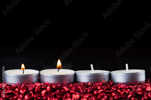 Four candles for Advent season in Christian church.