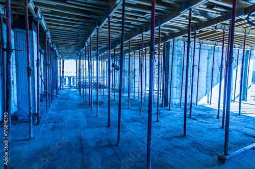 Pouring concrete in the con...