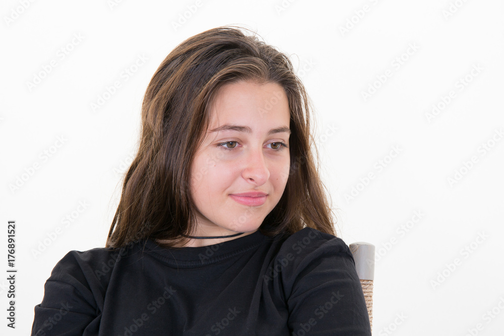 beautiful young girl sitting on the side beautiful young girl sitting on the side