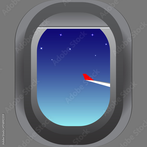 The view from the porthole of the aircraft to the wing and the starry evening sky. Vector image.