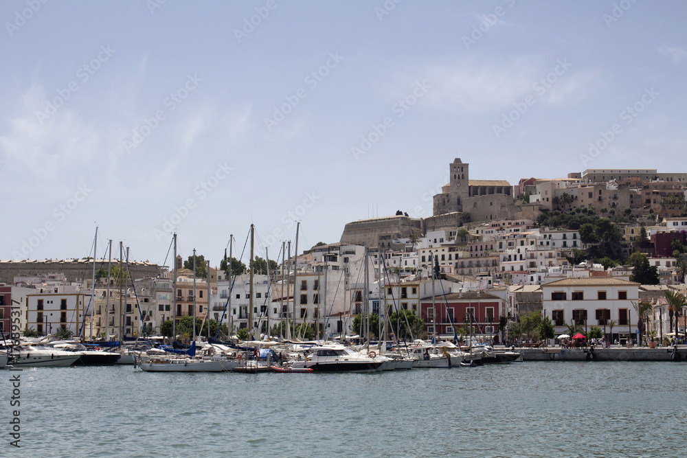 View of moored yachts and old town of Ibiza. It is one of the Ba