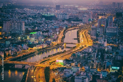 Saigon river in Ho Chi Minh city by night, Vietnam