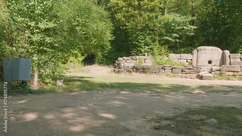 View of dolmen in green underbush photo
