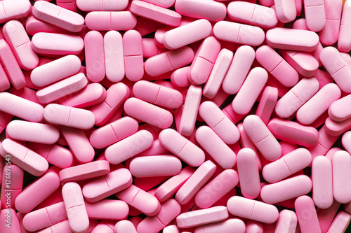 A lot of pink medicine pills