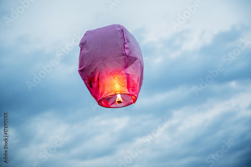 balloon fire Sky lantern flying lanterns, hot-air balloons Lantern flies up highly in the sky. photo