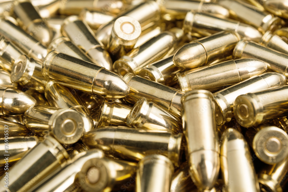 Naklejka premium Heap of pistol ammo