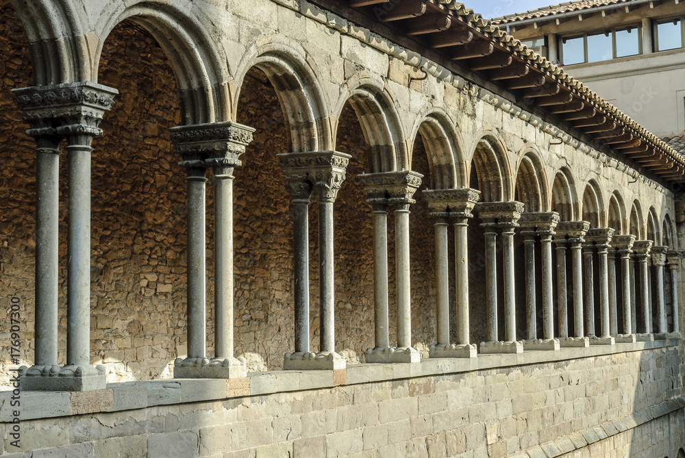 arches, columns and Romanesque capitals of the monastery of Santa Maria of Ripoll, in Catalonia, Spain.