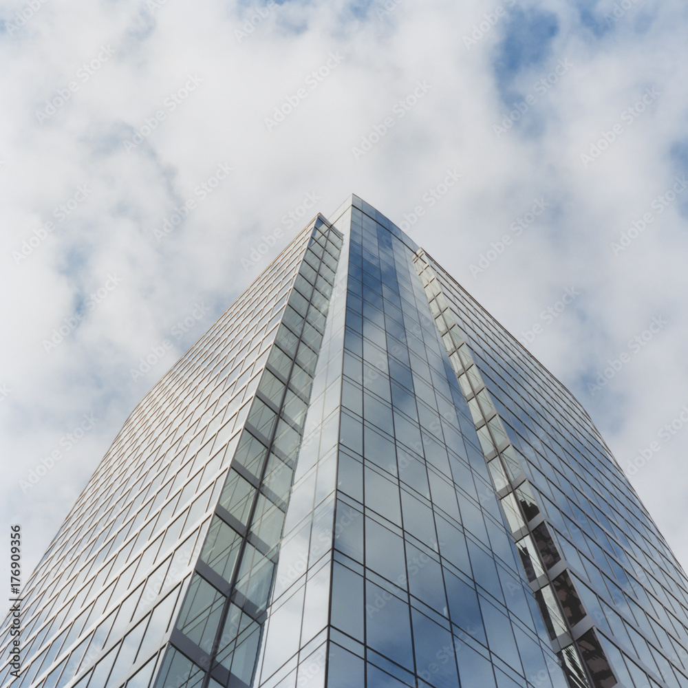 Exterior of modern office building, low angle view Exterior of modern office building, low angle view
