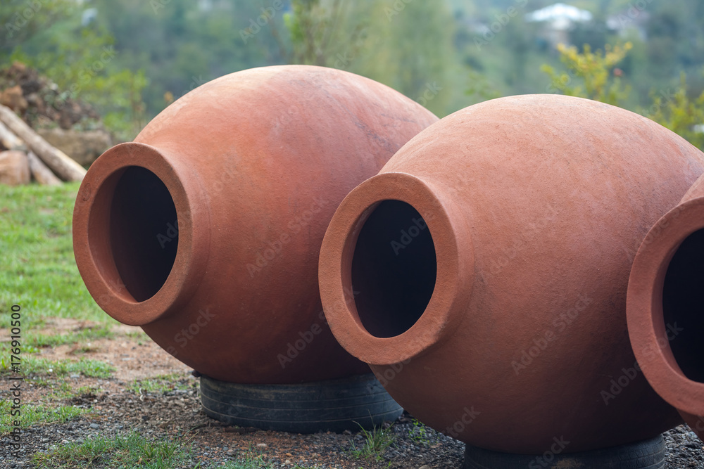 Georgian traditional jugs kvevri for wine, outdoor Georgian traditional jugs kvevri for wine, outdoor
