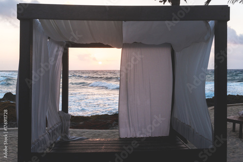 Mexican cabana on the beach at sunrise
