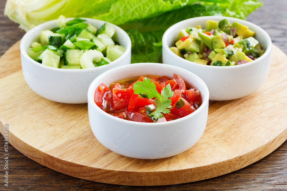 fresh sauces, guacamole, and salsa of tomatoes and cucumbers. fresh sauces, guacamole, and salsa of tomatoes and cucumbers.