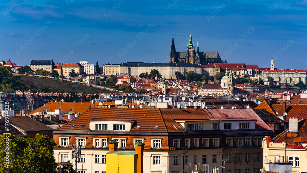 Lighten Prague during nice sunny day.  Clear blue sky over czech landmarks.